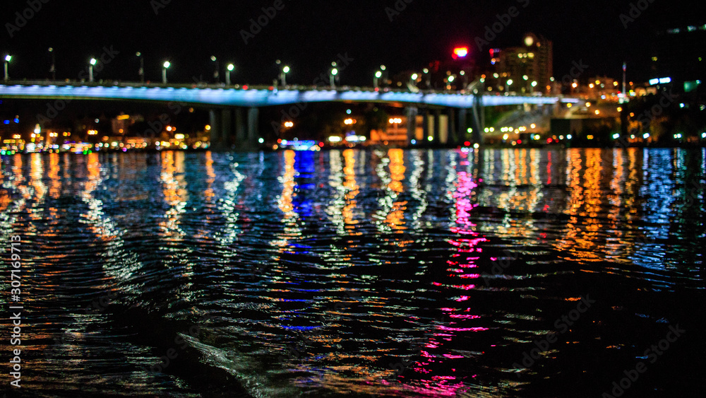 river and blured brige at night