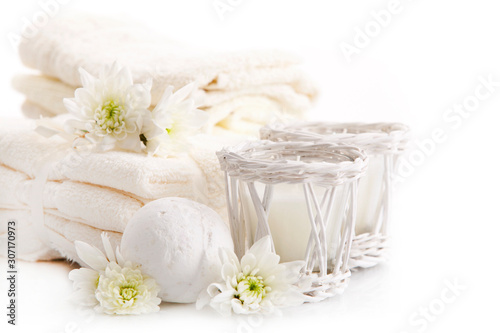 White face towels and candles