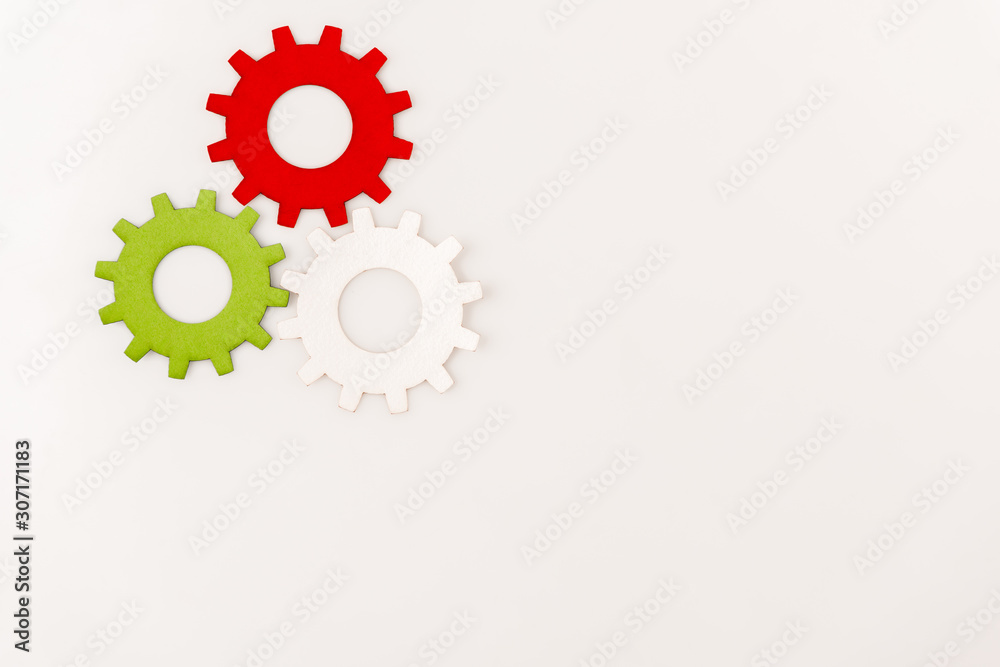 top view of colorful gears isolated on white