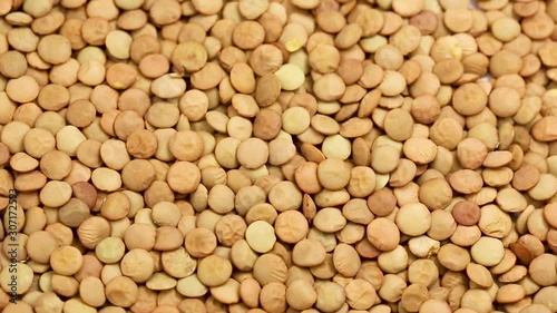Lentil groats in a circular motion. close up 