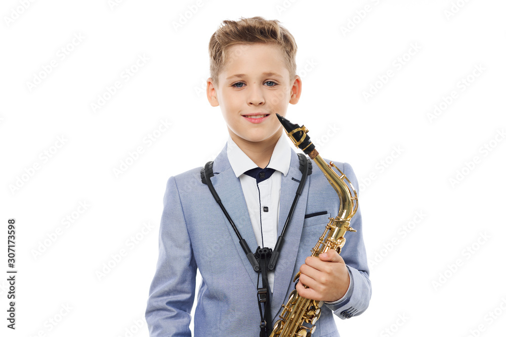 Fototapeta premium little boy with a saxophone