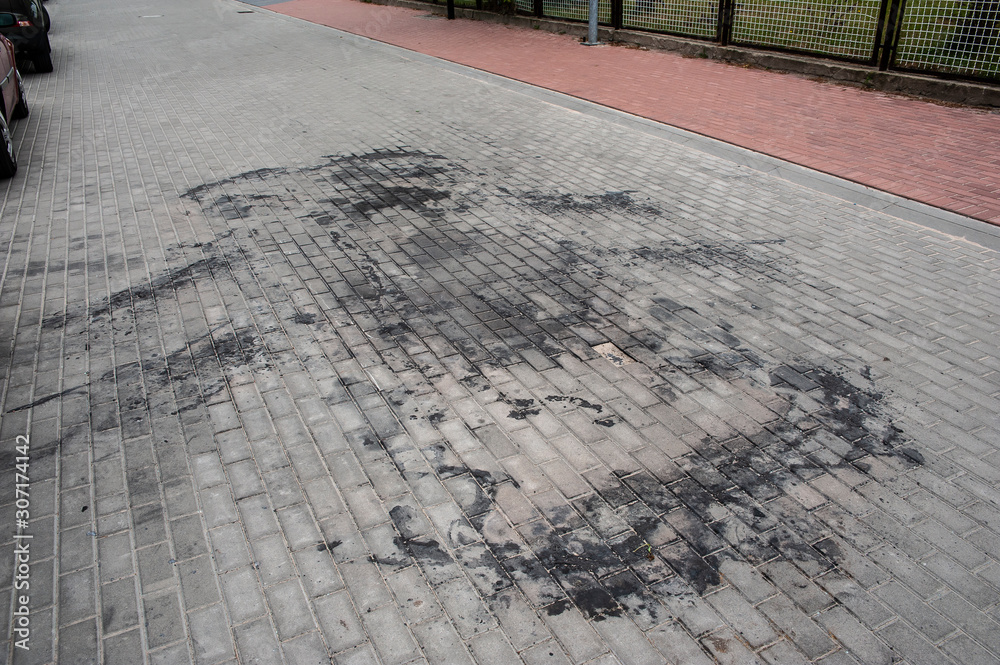 Sidewalk contaminated beacuse of burnt car
