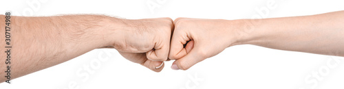 Foto Female and male caucasian hands  isolated white background showing gesture clash of fists