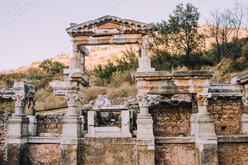 Antique city Ephesus. The ruins of an ancient city in Turkey. Selcuk, Kusadasi, Turkey. Archaeological excavations. Old barillefs. Ruined statues. photo