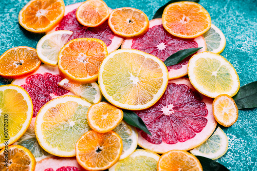 Slices of mandarin  orange  grapefruit and lemon very close-up  macro