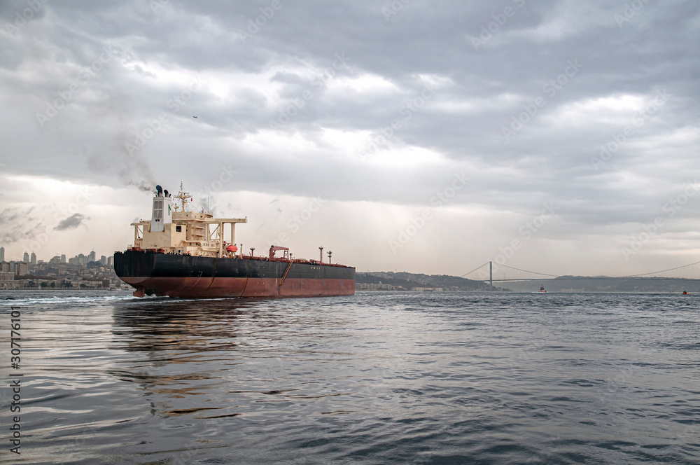 Cargo ship carrying oil passing through the Bosphorus.