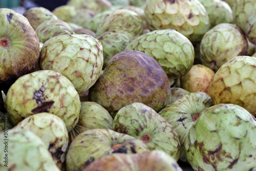 Close-up of custard apples at market stall