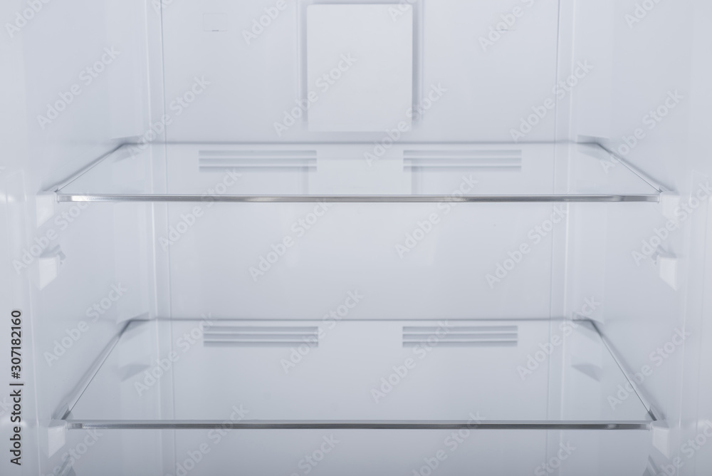 Fototapeta premium Refrigerator Isolated on White Background. Modern Kitchen and Domestic Major Appliances