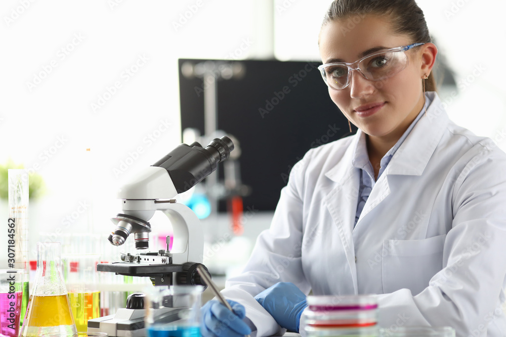 Smiling biomedical researcher in eyewear Smiling biomedical researcher in eyewear