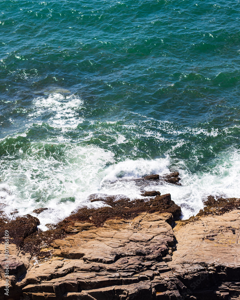 Blue waves crashing on the rocks Blue waves crashing on the rocks