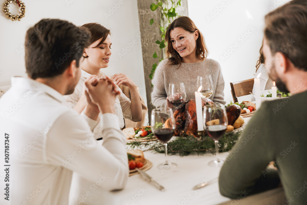 Happy big family celebrating Christmas together at home