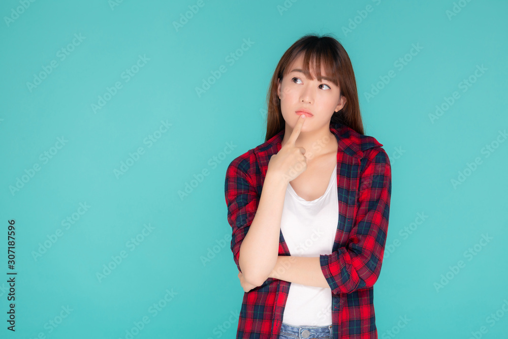 Beautiful portrait young asian woman wear clothes fashion travel thinking idea and enjoy summer holiday isolated blue background, girl smiling confident and cheerful, travel in vacation concept. Beautiful portrait young asian woman wear clothes fashion travel thinking idea and enjoy summer holiday isolated blue background, girl smiling confident and cheerful, travel in vacation concept.