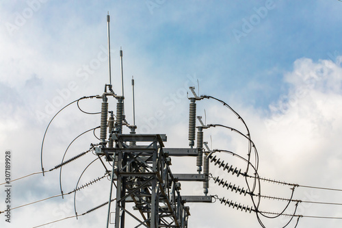high voltage electrical substation tower with open electrical Isolator or Electrical Isolation Switch, Elements of a substation