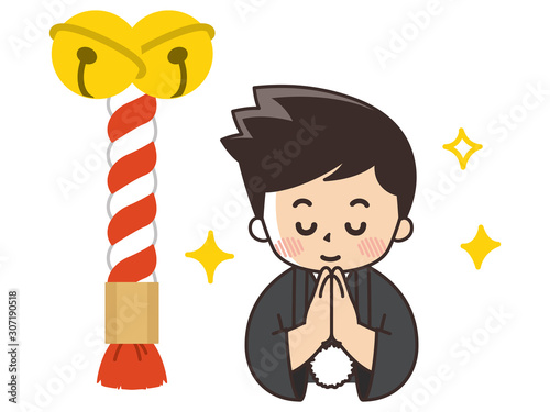 お祈りをする和装の男性