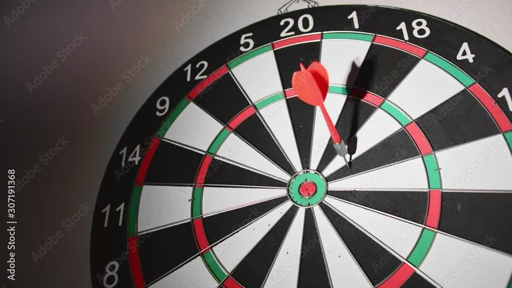 Throwing darts in the target, missing target, target marketing concept. Throwing darts in the target, missing target, target marketing concept.