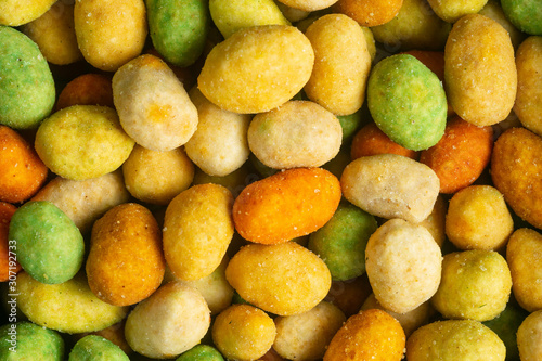 Peanuts with different seasonings, cheese, wasabi, closeup, texture