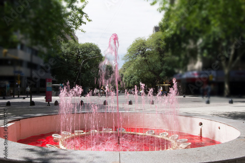 Red water fountain in Mendoza City, Mendoza Province, Argentina photo