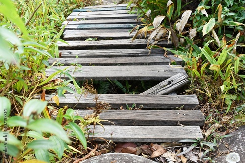 old and dirty broken wood bridge on walk way