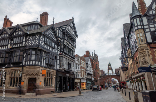 9 August 2019: Chester, Cheshire, England, UK - Half timbered houses in Bridge Street in cloudy day #307196998