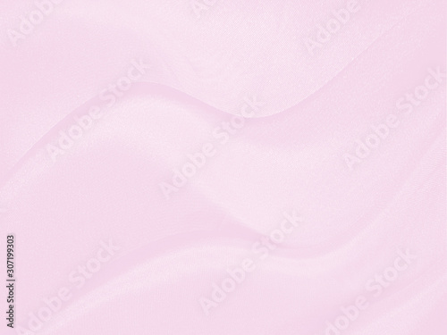 The surface of the fabric Resulting in a bright pink tone, Wave pattern, Abstract pink fabric background.