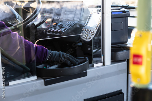 Warm clothes and a comfortable driver's cab in European countries. bus driver.