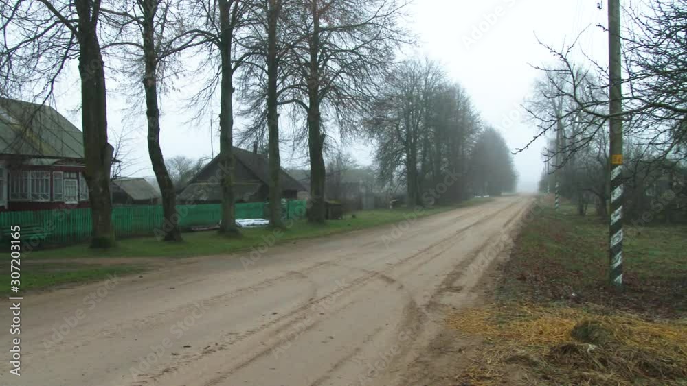 The village road. Rural life concept. Lonely Dusty Road in a Village. 4k