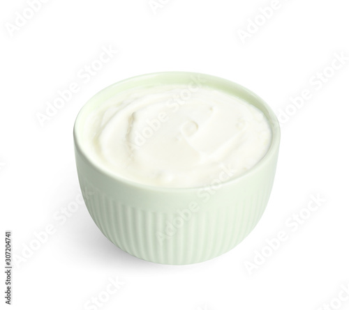 Tasty organic yogurt in bowl isolated on white