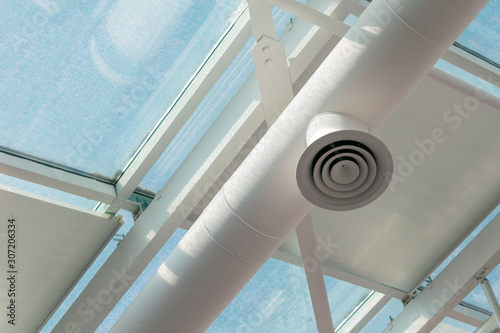 Schilderij op canvas White ventilation pipe on the polycarbonate transparent ceiling