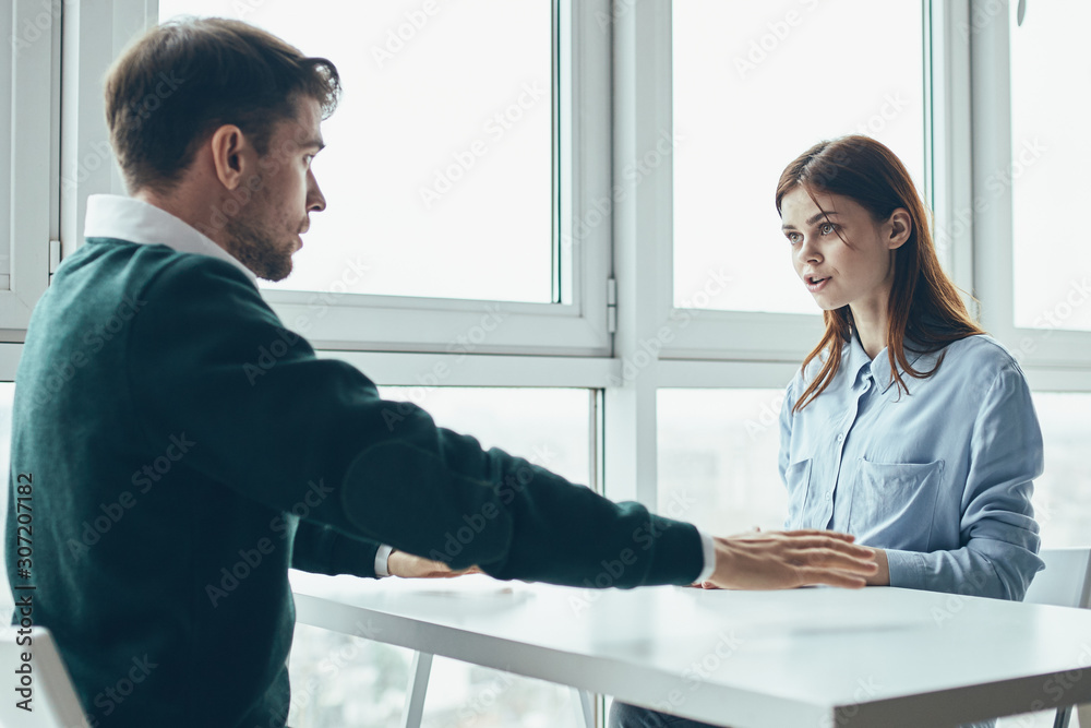 business people shaking hands finishing up a meeting business people shaking hands finishing up a meeting