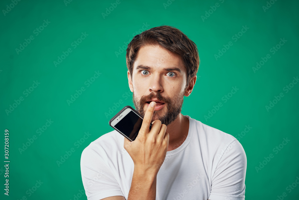 young man talking on cell phone young man talking on cell phone