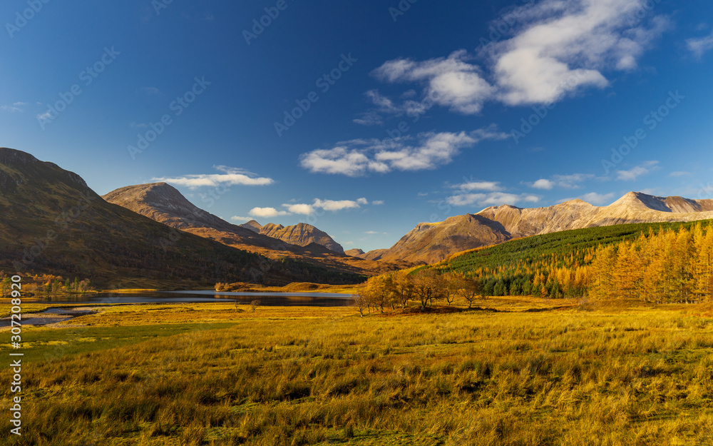 Beautiful autumn colours in mountain valley in the Scottish Highlands