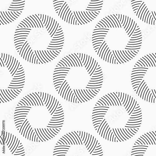 Abstract seamless pattern of repeating round striped circular ornaments.