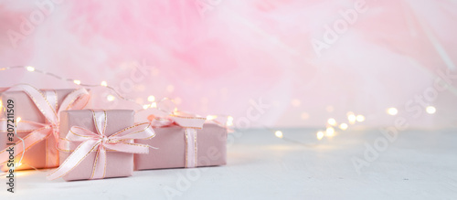 Valentine's day.Gift boxes set in pink on a monochrome background, holiday concept, wedding invitation, birthday cards and mothers day Long banner