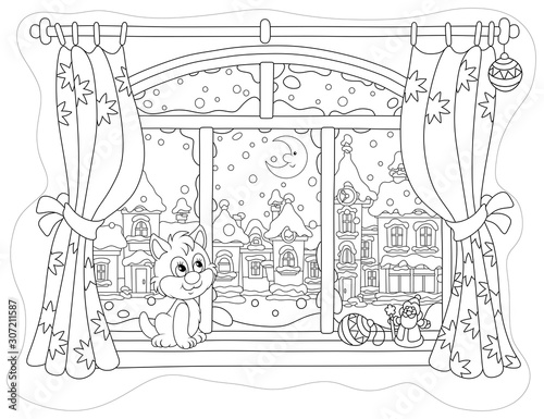 Little curious kitten sitting on a windowsill, looking through a window at the bright moon over a beautiful snow-covered town on a frosty winter night, black and white vector cartoon illustration