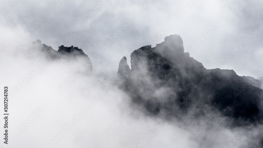 mountain peaks in the clouds on madeira island