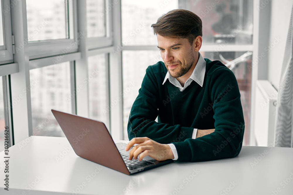 businessman working on laptop in office businessman working on laptop in office