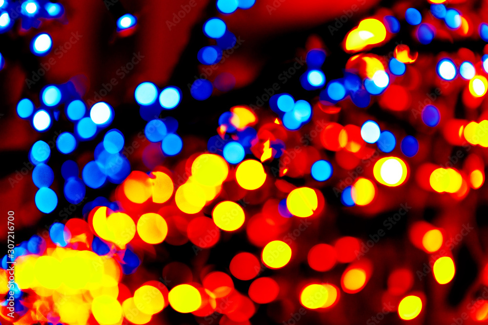 Colorful circles bokeh festive glitter dark background. Holiday greeting cards, invitations, flyers, blog posts, banners design. Christmas lights bokeh overlay.