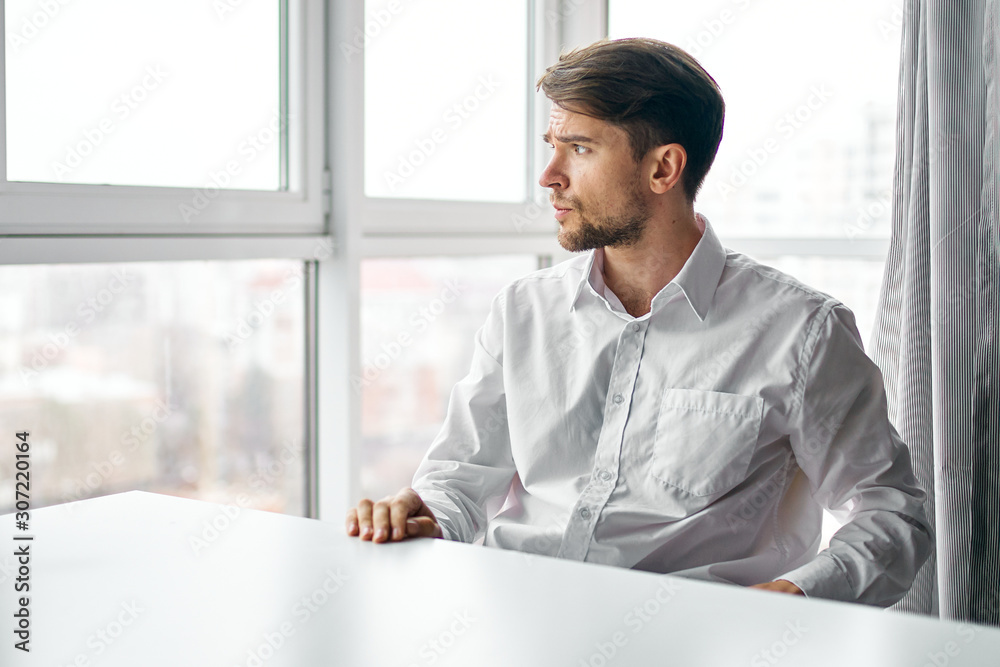 businessman sitting at his desk