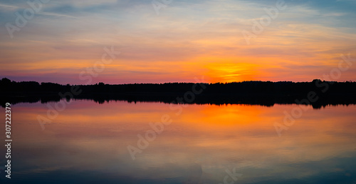 sunset over lake © Valdemaras Mockus