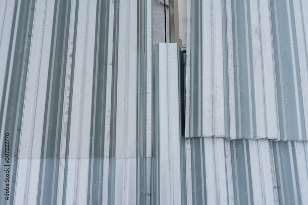 sheet of metal. Factory for the creation of metal roofing. The process of creating a metal roof. sheet of metal. Factory for the creation of metal roofing. The process of creating a metal roof.