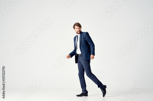 businessman on top of stairs