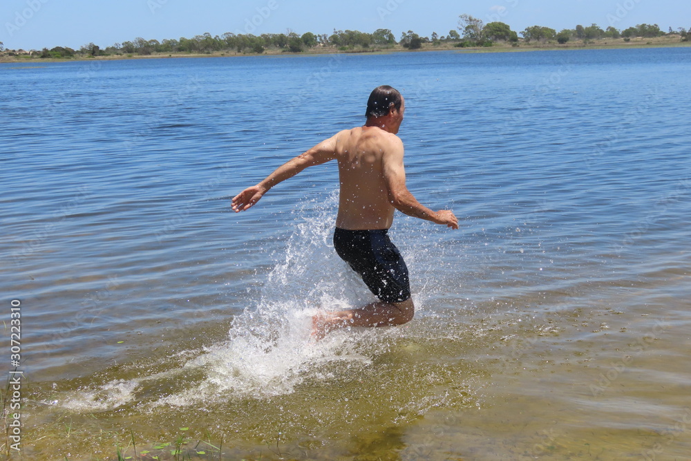 Fototapeta premium man on the beach