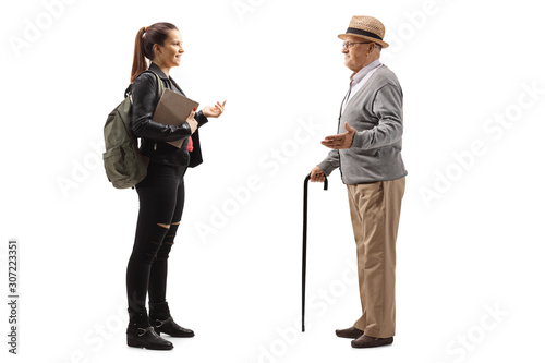Grandfather talking with a teenage granddaughter