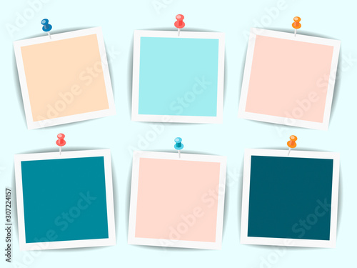 A set of six photos on the wall pinned with colorful pins