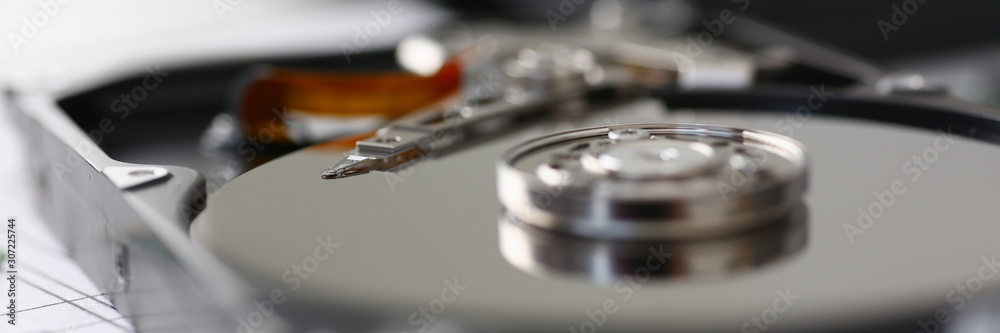 Hard drive from computer or laptop lies on the table Hard drive from computer or laptop lies on the table
