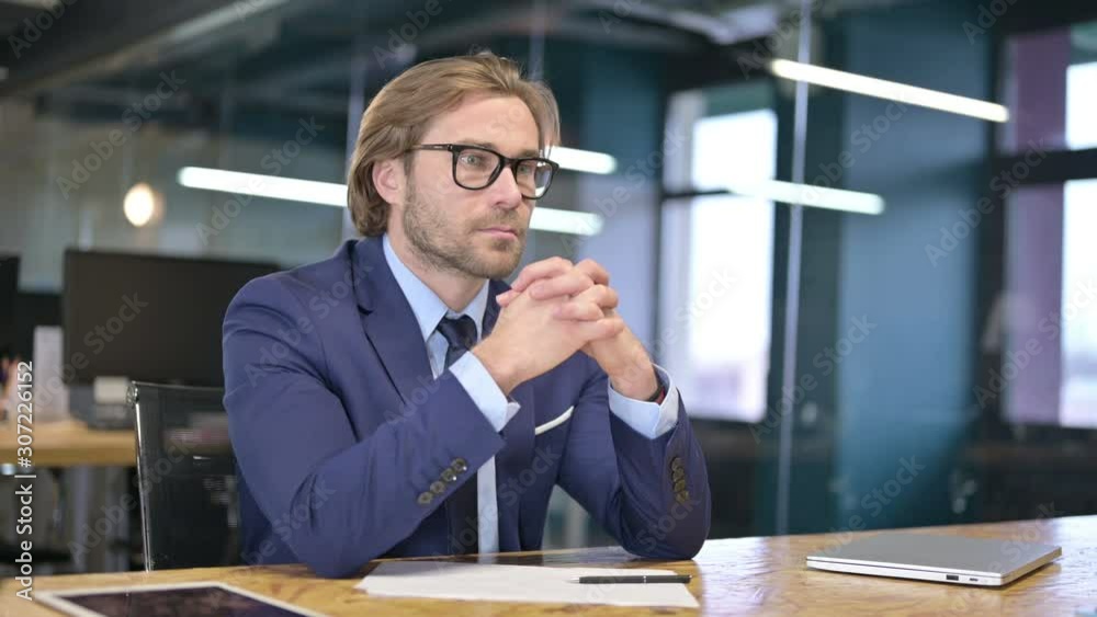 Pensive Businessman Thinking New Idea, Brainstorming at Work Pensive Businessman Thinking New Idea, Brainstorming at Work