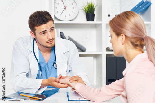 doctor with patient in office