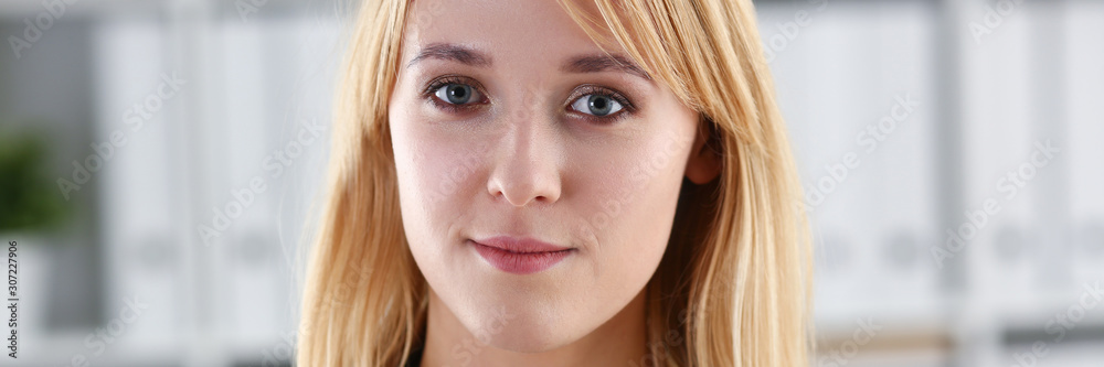 Beautiful smiling girl at workplace look in camera Beautiful smiling girl at workplace look in camera