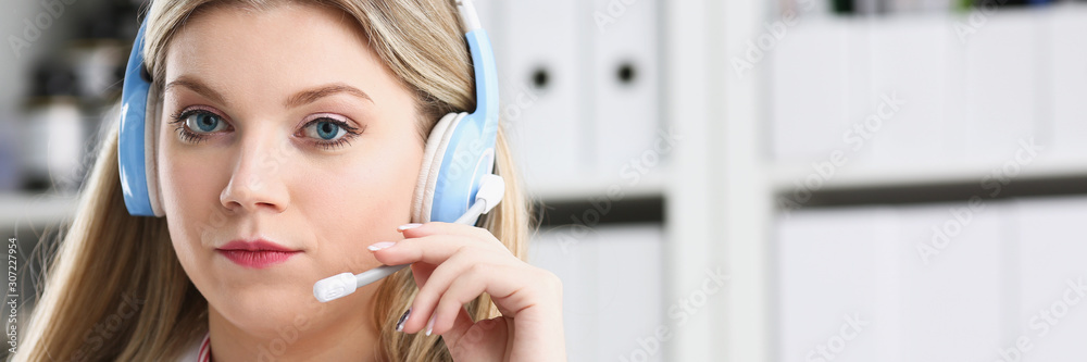 Portrait of happy smiling young doctor in headset Portrait of happy smiling young doctor in headset