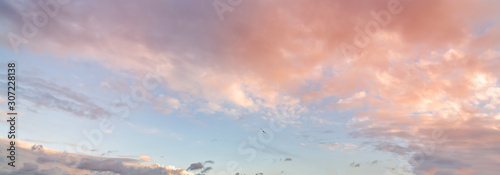 Beautiful sunset sky. Dramatic colorful clouds after sunset. Nature backgrounds.  © Inga Av